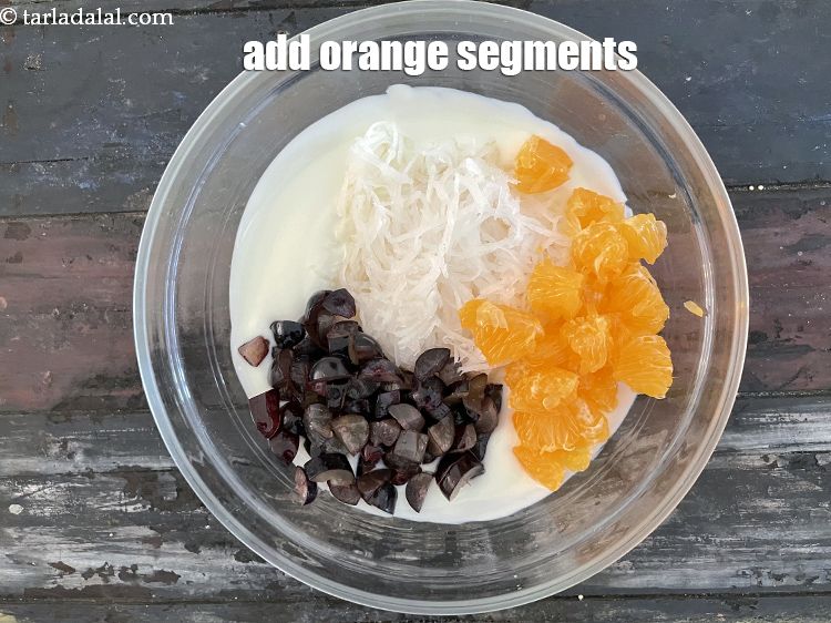 Step 13 – Add&nbsp;1/2 cup&nbsp;<a href="https://tarladalal.com/glossary-orange-segments-116i">orange segments</a>.