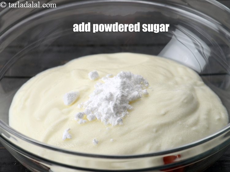 Step 8 – Add 2 tsp <a href="https://www.tarladalal.com/glossary-powdered-sugar-280i">powdered sugar</a>.