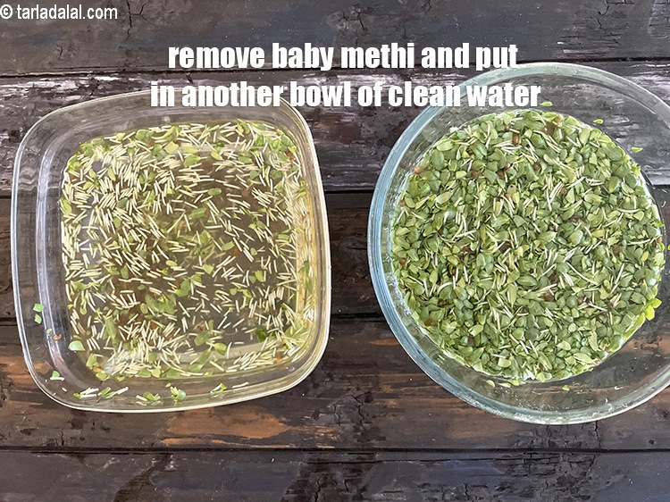 Step 8 – Remove the baby methi with your hands and put in another bowl of water.&nbsp;