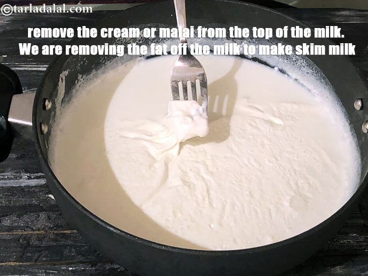 Step 15 – remove the cream or malai from the top of the milk. We are removing the …