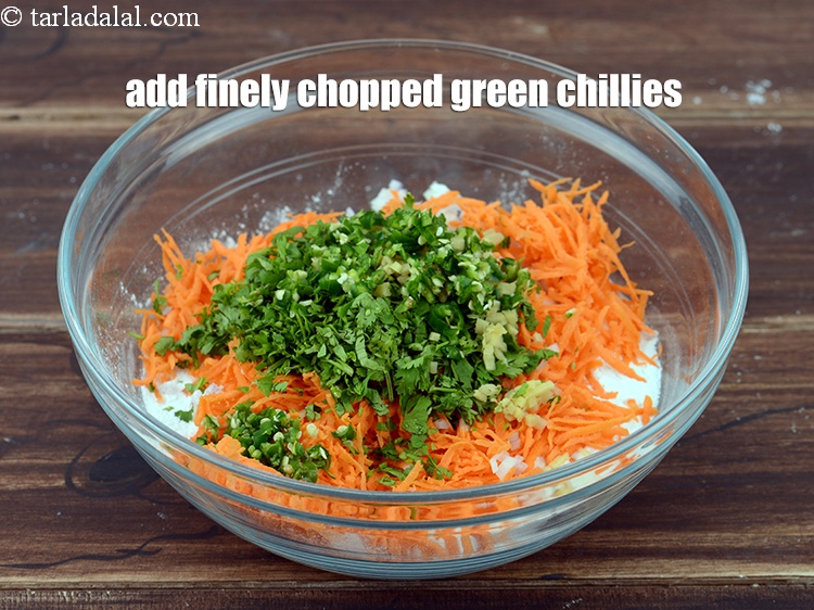 Step 8 – Add 2 tsp finely <a href="https://www.tarladalal.com/glossary-chopped-green-chilli-820i">chopped green chillies</a>.