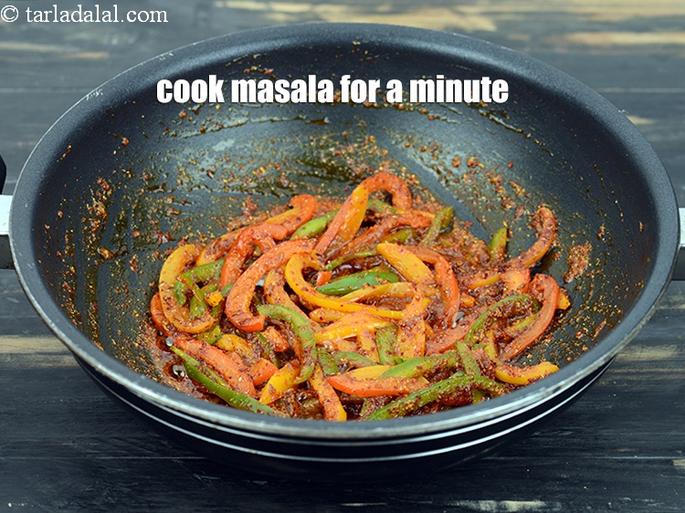 Step 15 – Cook the masala on medium flame for a minute.