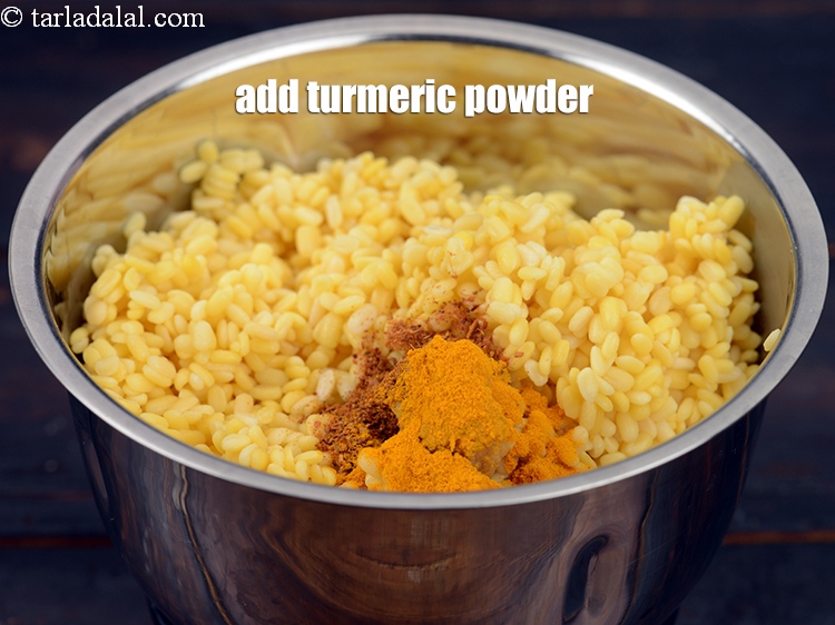 Step 9 – Add &frac14; tsp&nbsp;<a href="https://www.tarladalal.com/glossary-turmeric-powder-haldi-645i">turmeric powder (haldi)</a>.