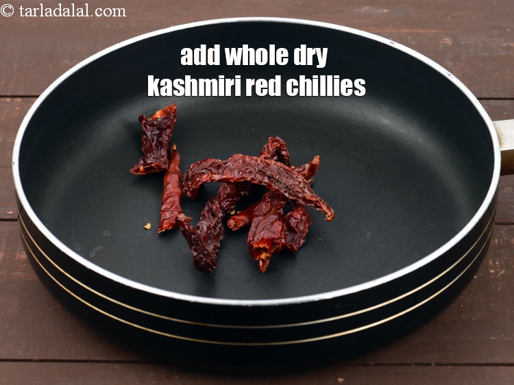 Step 9 – Add 3 to 4&nbsp;<a href="https://www.tarladalal.com/glossary-whole-dry-kashmiri-red-chillies-kashmiri-mirch-kashmiri-lal-mirch-332i">whole dry kashmiri red chillies</a>.