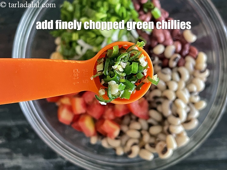 Step 33 – Add&nbsp;<meta charset="UTF-8" />1 tsp&nbsp;finely&nbsp;<a href="glossary-chopped-green-chilli-820i">chopped green chillies</a>.