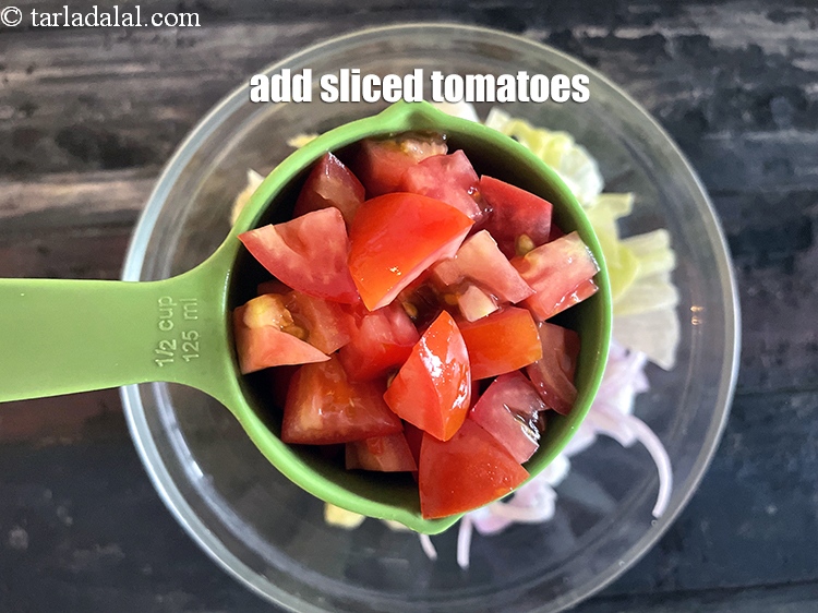 Step 17 – Add&nbsp;<meta charset="UTF-8" />1/2 cup&nbsp;<a href="glossary-sliced-tomatoes-746i">tomato , sliced</a>.