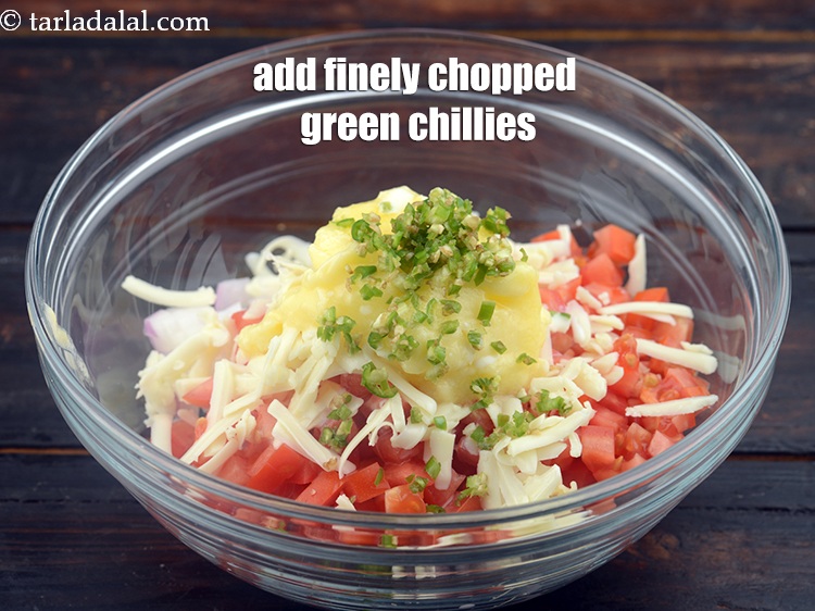 Step 8 – Add 1 tsp&nbsp;finely&nbsp;<a href="https://www.tarladalal.com/glossary-chopped-green-chilli-820i">chopped green chillies</a>.&nbsp;
