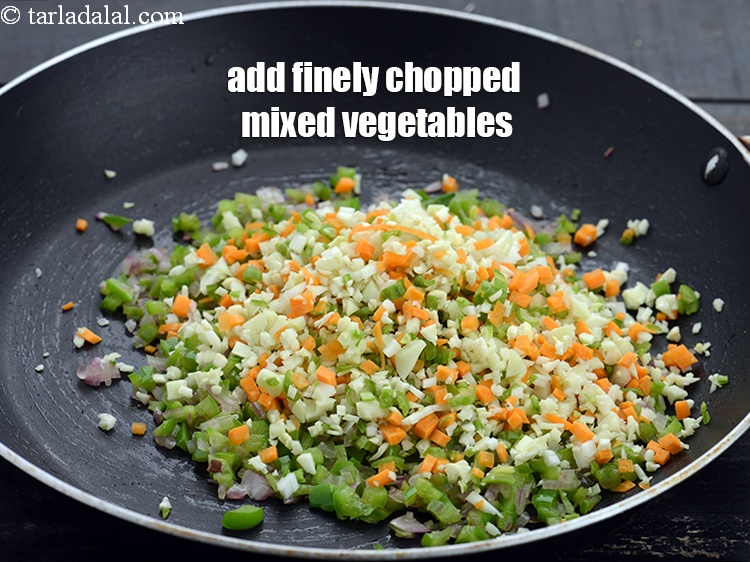 Step 8 – Add 1/2 cup&nbsp;finely&nbsp;<a href="https://www.tarladalal.com/glossary-chopped-mixed-vegetables-782i">chopped mixed vegetables</a>.