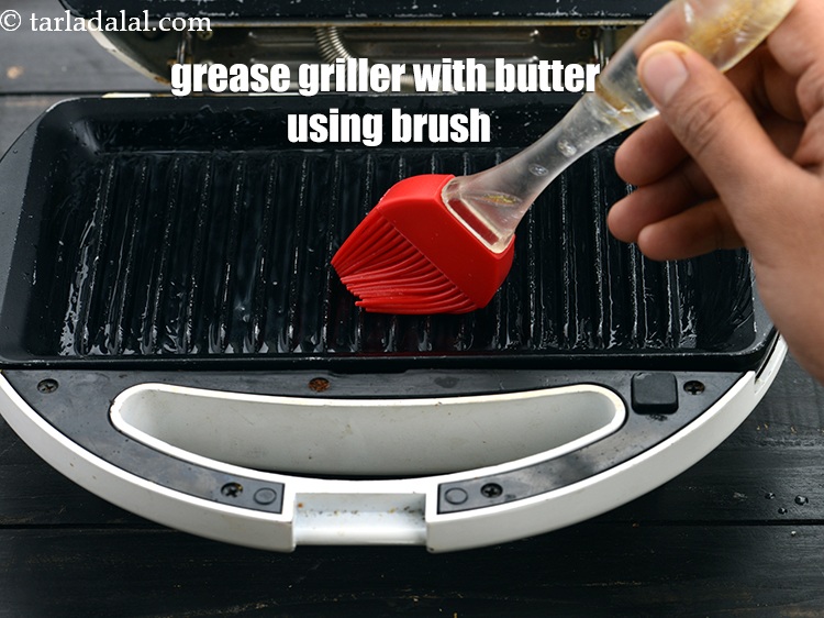 Step 8 – Grease the griller with butter using brush.