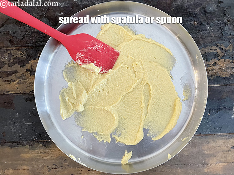 Step 15 – Spread it using a spatuala or&nbsp;spoon.&nbsp;Keep aside.