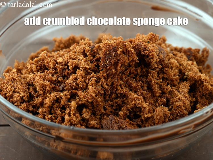 Step 8 – Add 1 &frac12; cups <a href="https://www.tarladalal.com/glossary-crumbled-chocolate-sponge-cake-2263i">crumbled chocolate sponge cake</a>. Here is the link for <a …