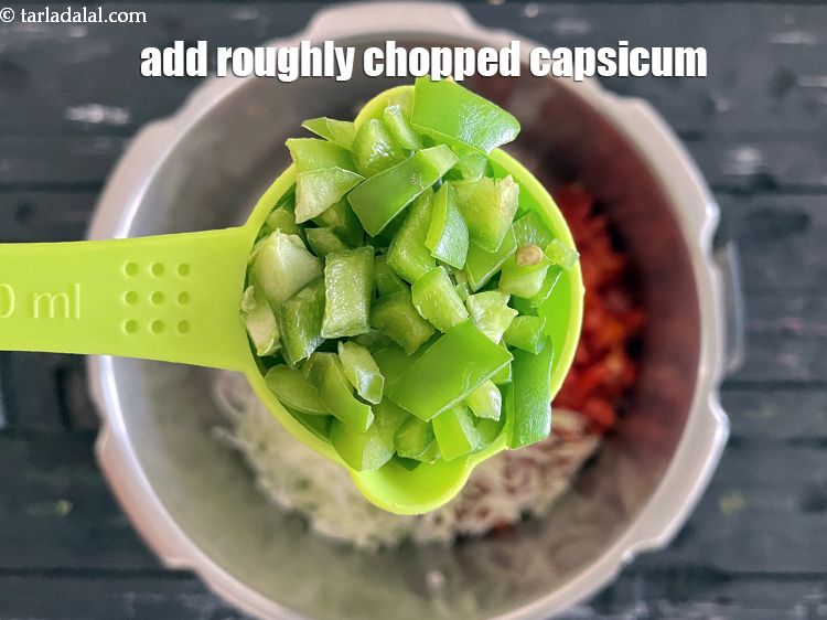 Step 11 – Add&nbsp;<meta charset="UTF-8" />1/4 cup&nbsp;roughly chopped&nbsp;<a href="glossary-capsicum-shimla-mirch-bell-pepper-163i">capsicum</a>.