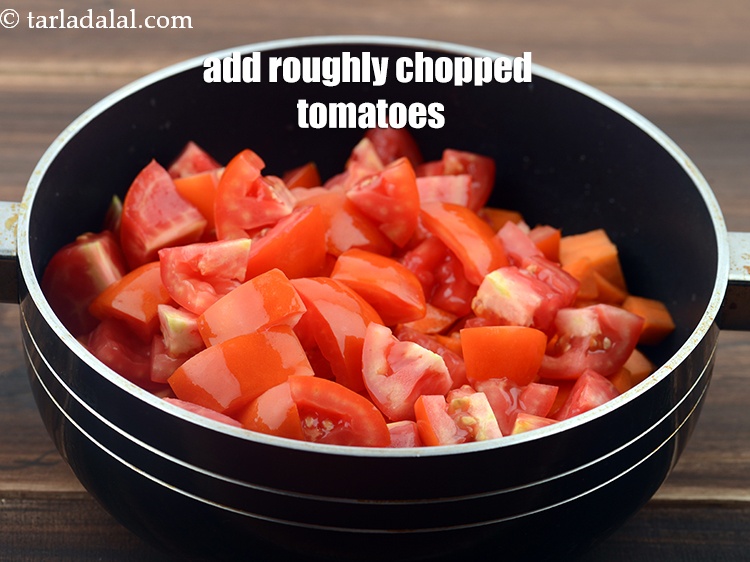 Step 8 – Add 2 cups roughly&nbsp;<a href="https://www.tarladalal.com/glossary-chopped-tomatoes-779i">chopped tomatoes</a>.