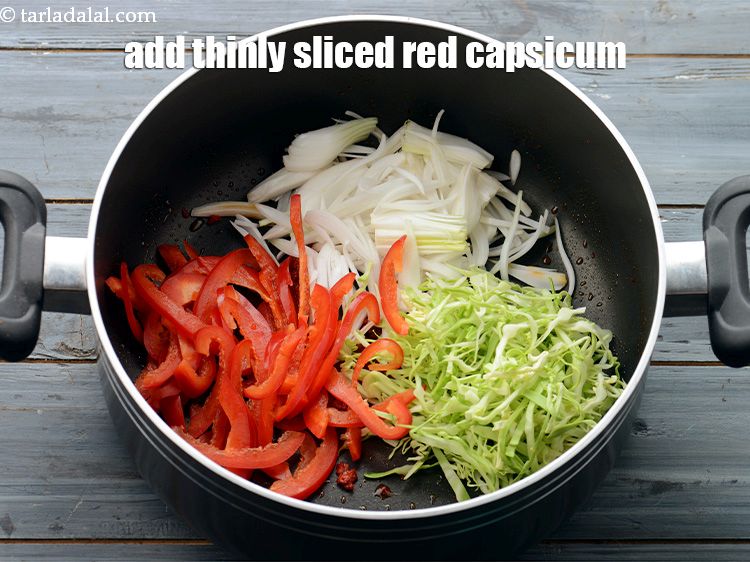 Step 15 – Add 1/2 cup&nbsp;thinly&nbsp;<a href="https://www.tarladalal.com/glossary-sliced-red-capsicum-2176i">sliced red capsicum</a>. We have used red capsicum as it has a …