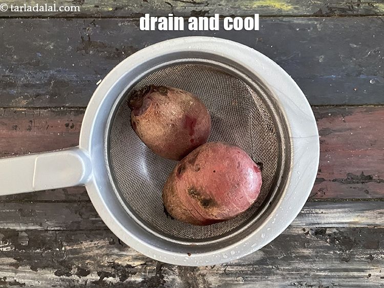 Step 9 – Drain out the excess water and keep aside to cool slightly.