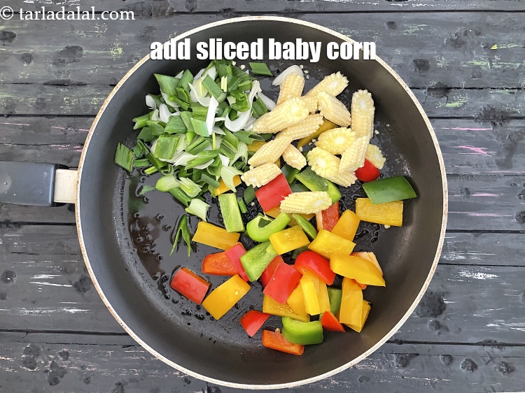 Step 10 – Add&nbsp;<meta charset="UTF-8" />1/2 cup&nbsp;<a href="glossary-sliced-baby-corn-751i">baby corn, sliced</a>.