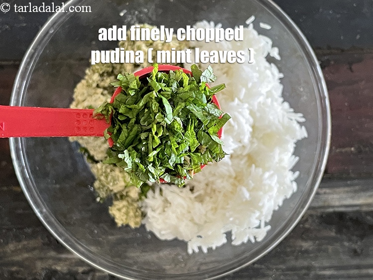 Step 8 – Add 4&nbsp;tbsp&nbsp;finely&nbsp;<a href="glossary-chopped-mint-788i">chopped mint leaves (phudina)</a>.