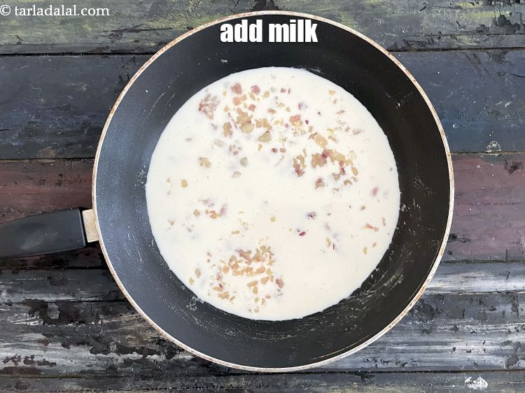 Step 15 – Add&nbsp;3/4 cup&nbsp;<a href="glossary-milk-doodh-full-cream-milk-514i">milk</a>.