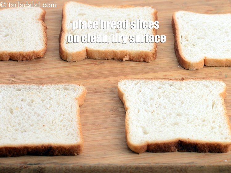 Step 8 – Place 5 <a href="https://www.tarladalal.com/glossary-bread-219i">bread</a>&nbsp;slices on a clean, dry surface.