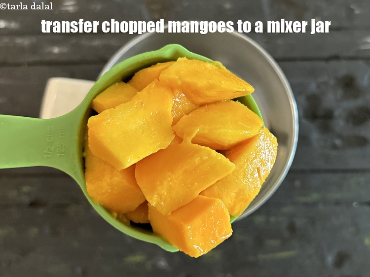Step 15 – Transferr the mangoes to a mixer jar.