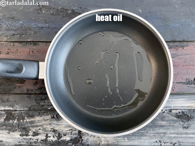 Step 9 – <meta charset="UTF-8" />Heat &frac12; tsp of oil in a small non-stick pan.