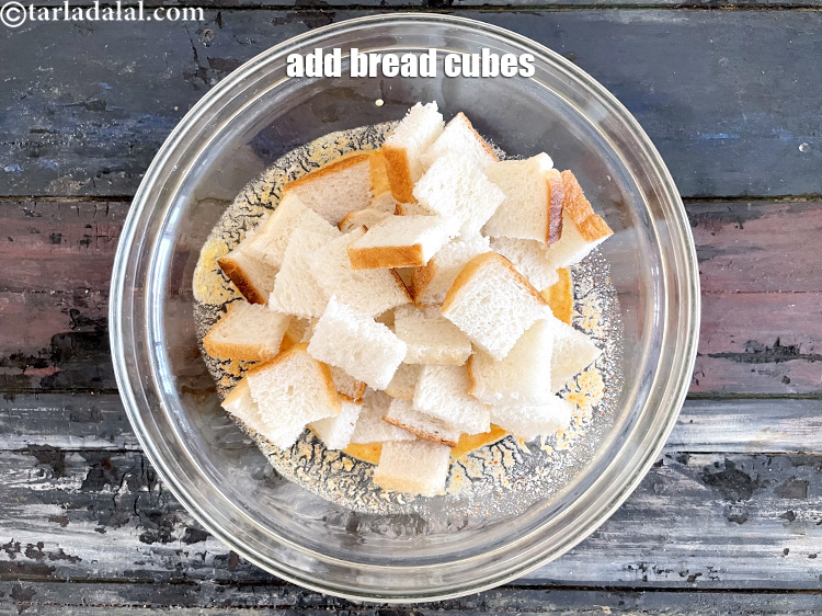 Step 12 – <meta charset="UTF-8" />Add the bread cubes.