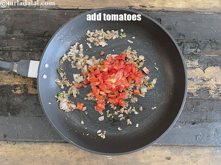 Step 25 – Add&nbsp;<meta charset="UTF-8" />1/2 cup&nbsp;<a href="glossary-chopped-tomatoes-779i">chopped tomatoes</a>.