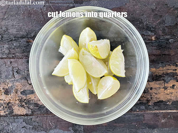 Step 9 – Cut the lemons into quaters. You may deseed the lemons if you wish to.