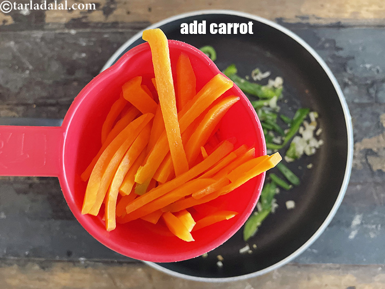 Step 16 – Add&nbsp;<meta charset="UTF-8" />3/4 cup&nbsp;thinly sliced parboiled&nbsp;<a href="glossary-carrot-gajar-gajjar-253i">carrot</a>.