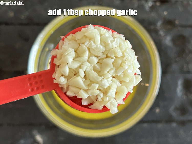Step 9 – Add 1&nbsp;tbsp chopped garlic.