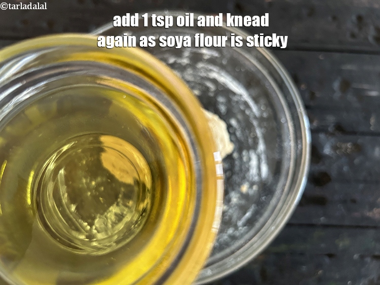 Step 9 – Add 1 tsp oil and knead again as soya flour is sticky.