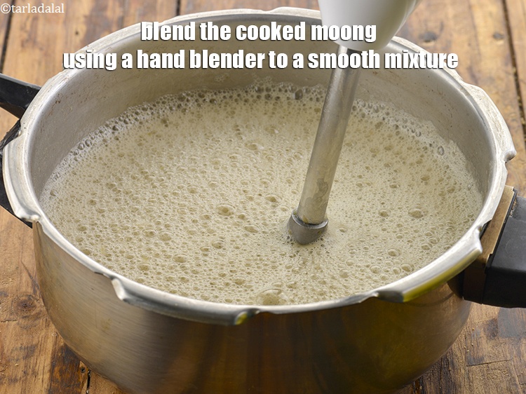 Step 11 – Blend the cooked moong using a hand blender to a smooth mixture.