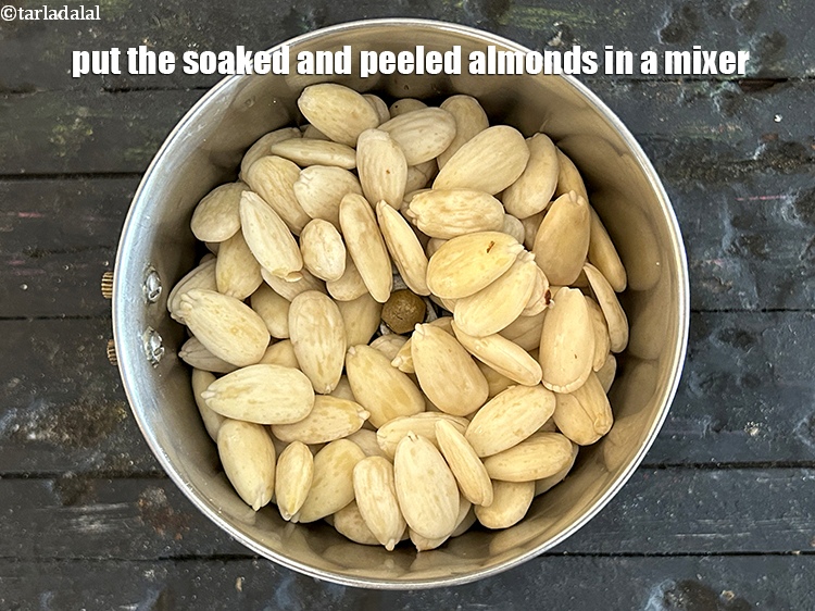 Step 9 – Put the soaked and peeled almonds in a mixer.