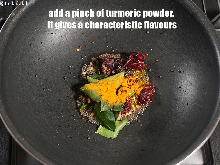 Step 9 – Add a pinch of <a href="https://www.tarladalal.com/glossary-turmeric-powder-haldi-645i">turmeric powder (haldi)</a>. It gives a characteristic flavours.