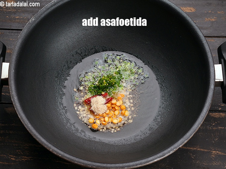 Step 9 – Add &frac14; tsp asafoetida.