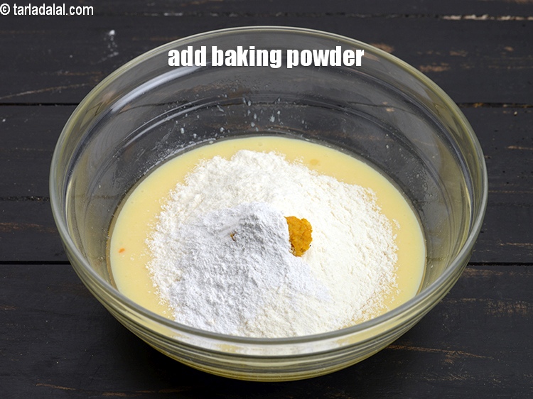 Step 10 – Add 1 tsp <a href="https://www.tarladalal.com/glossary-baking-powder-425i">baking powder</a>.