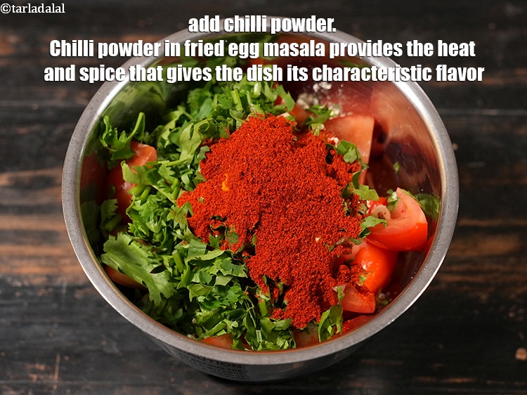 Step 9 – Add 1&frac12; tsp <a href="https://www.tarladalal.com/glossary-chilli-powder-red-chilli-powder-339i">chilli powder</a>. Chilli powder in fried egg masala provides the heat …