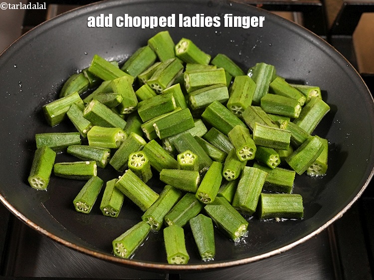 Step 9 – Add 3 cups <a href="https://www.tarladalal.com/glossary-chopped-ladies-finger-844i">chopped ladies finger (bhindi)</a>.