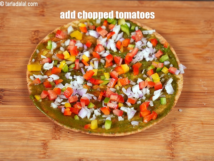 Step 9 – Add &frac12; tbsp finely chopped tomatoes.