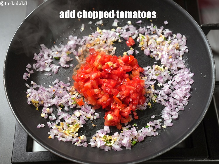 Step 9 – Add&nbsp;1/2 cup&nbsp;<a href="https://www.tarladalal.com/glossary-chopped-tomatoes-779i">chopped tomatoes</a>.