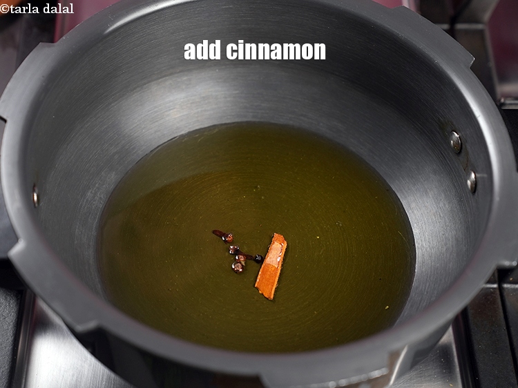 Step 9 – Add 2 inch <a href="https://www.tarladalal.com/glossary-cinnamon-dalchini-346i">cinnamon (dalchini)</a>.