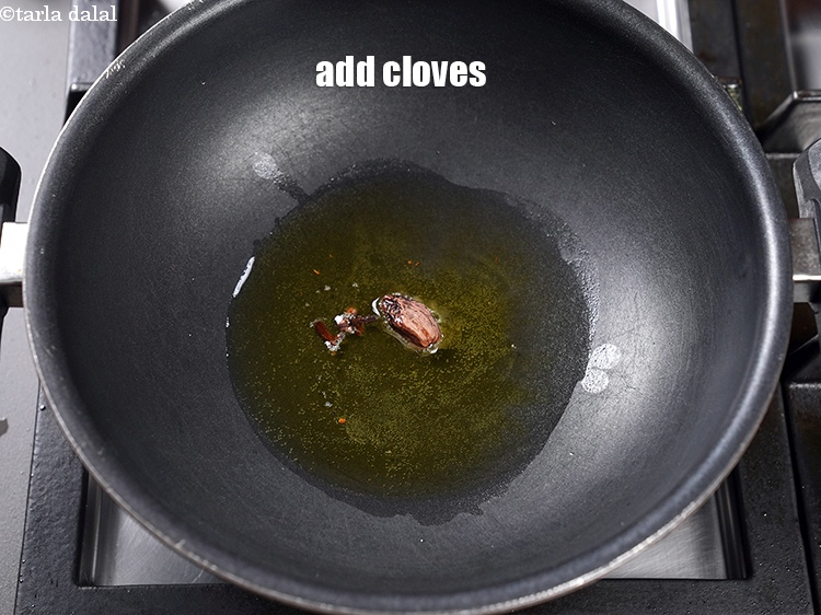 Step 13 – Add 3 cloves.