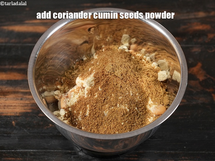 Step 9 – Add 1 tbsp <a href="https://www.tarladalal.com/glossary-coriander-cumin-seeds-powder-dhania-jeera-powder-375i">coriander-cumin seeds (dhania-jeera) powder</a>.