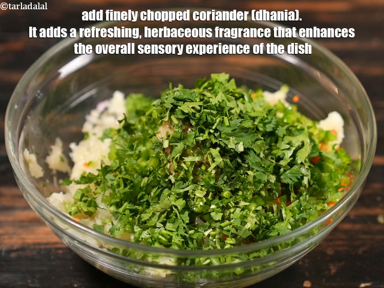 Step 9 – Add &frac14; cup finely <a href="https://www.tarladalal.com/glossary-chopped-coriander-783i">chopped coriander (dhania)</a>. It adds a refreshing, herbaceous fragrance that …