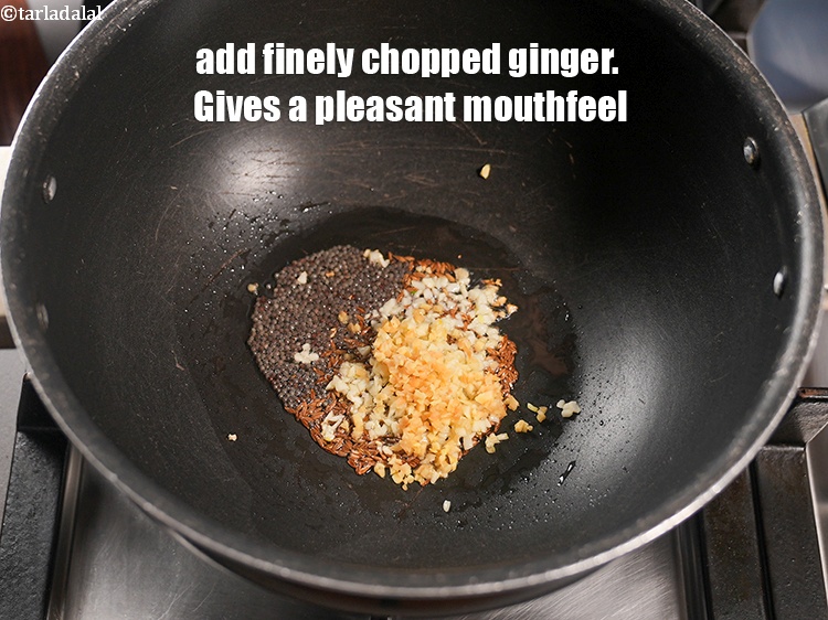 Step 9 – Add 1 tsp finely <a href="https://www.tarladalal.com/glossary-chopped-ginger-786i">chopped ginger (adrak)</a>. Gives a pleasant mouthfeel.
