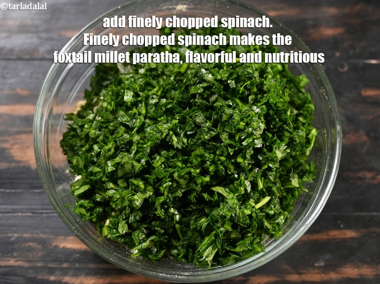 Step 9 – Add 2 cups finely <a href="https://www.tarladalal.com/glossary-chopped-spinach-780i">chopped spinach (palak)</a>. Finely chopped spinach makes the foxtail millet …