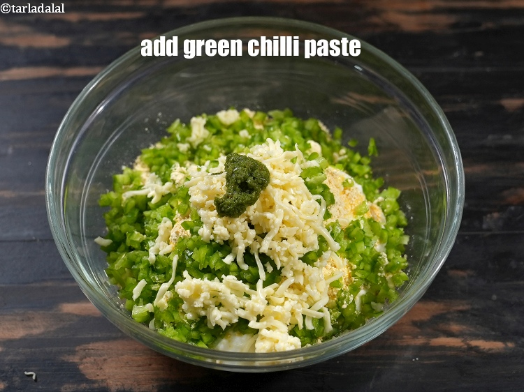 Step 9 – Add 1 tsp <a href="https://www.tarladalal.com/glossary-green-chilli-paste-hari-mirch-ki-paste-mirchi-paste-333i">green chilli paste</a>.