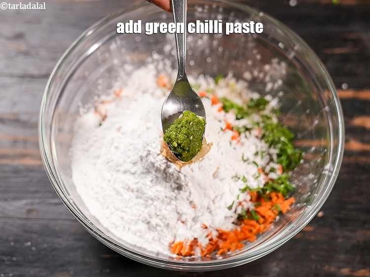 Step 9 – Add &frac12; tsp <a href="https://www.tarladalal.com/glossary-green-chilli-paste-hari-mirch-ki-paste-mirchi-paste-333i">green chilli paste</a>.