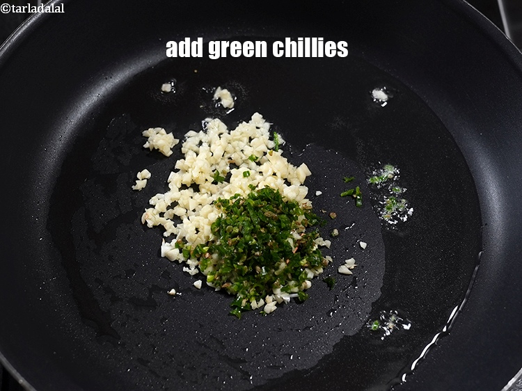 Step 13 – Add &frac12; tbsp&nbsp;finely chopped green chillies.