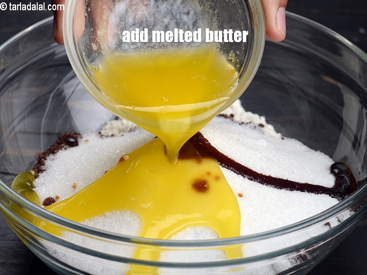 Step 9 – Add 3 tbsp <a href="https://www.tarladalal.com/glossary-melted-butter-1941i">melted butter</a>.